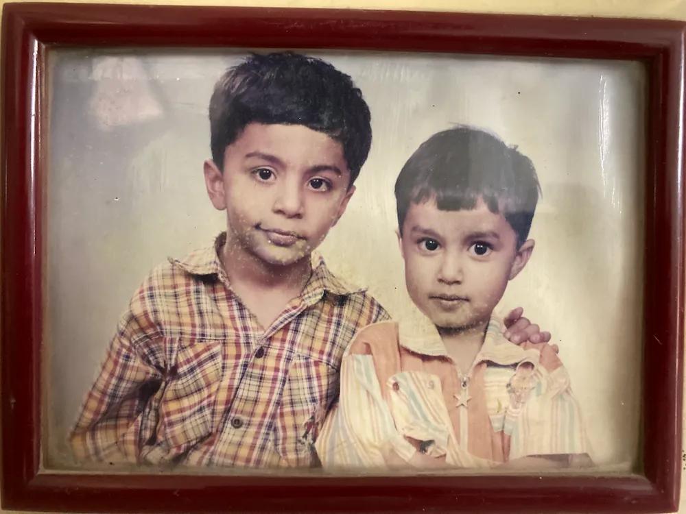My younger brother and me, framed sometime around 2001.